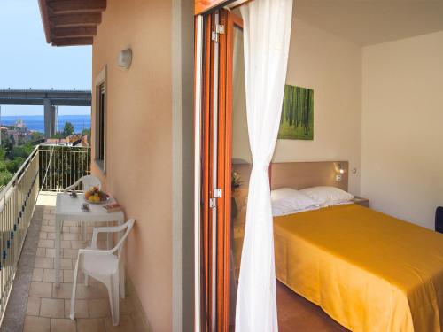 Posteľ alebo postele v izbe v ubytovaní Residence Villa Mare Taormina