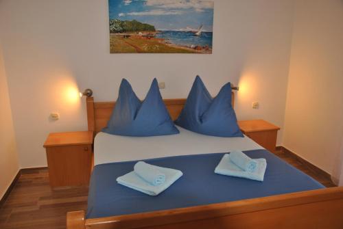 Posteľ alebo postele v izbe v ubytovaní Apartments Villa Macola