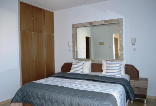 Ένα ή περισσότερα κρεβάτια σε δωμάτιο στο Millie's Apartments