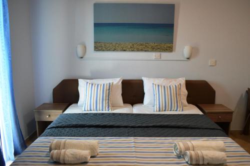Ένα ή περισσότερα κρεβάτια σε δωμάτιο στο Millie's Apartments