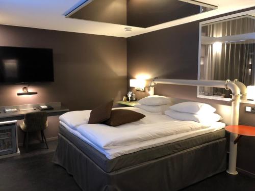 Postel nebo postele na pokoji v ubytování Original Sokos Hotel Seurahuone Kotka