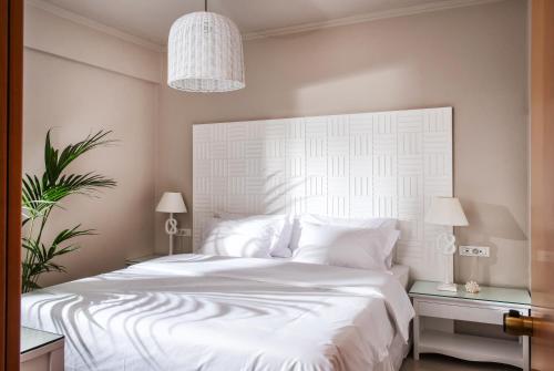 Katil atau katil-katil dalam bilik di Notos Heights Hotel & Suites