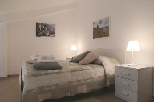 Postel nebo postele na pokoji v ubytování Casa Diletta