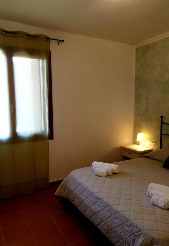 Ένα ή περισσότερα κρεβάτια σε δωμάτιο στο Residence Ataras
