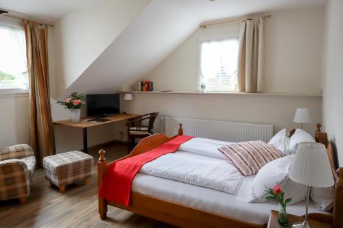 Postel nebo postele na pokoji v ubytování Hotel Gut Moschenhof