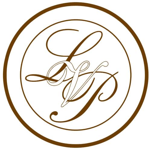 an initial handwriting signature in a circle on a plate at La Vecchia Posta B&B in Calangianus