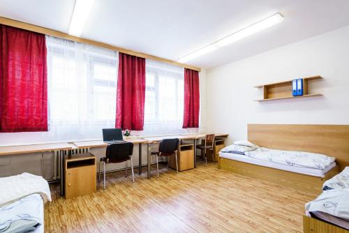 TV in/ali zabaviščno središče v nastanitvi Hostel Sinkule