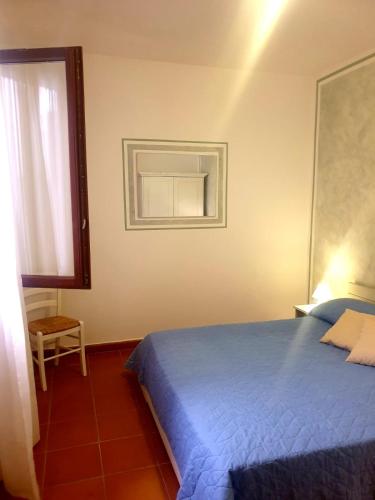 Ένα ή περισσότερα κρεβάτια σε δωμάτιο στο Residence Ataras