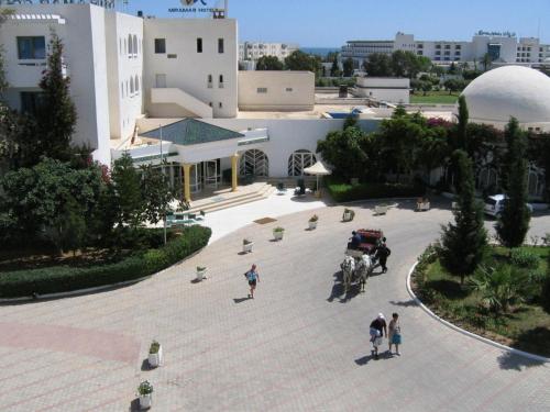 a group of people standing outside of a building at Miramar Sharm El Kantaoui ex Miramar Golf in Port El Kantaoui