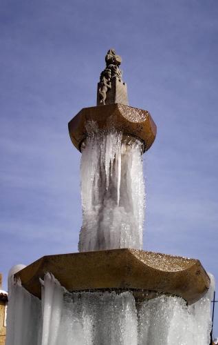 a fountain with ice on the top of it at La Posada in Cantavieja