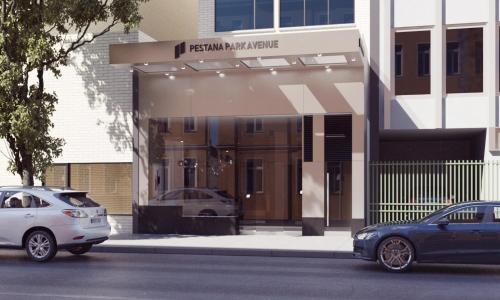 a car is parked in front of a building at Pestana Park Avenue in New York