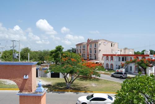 a view of a city with cars parked on a street at Hotel Tankah Cancun in Cancún