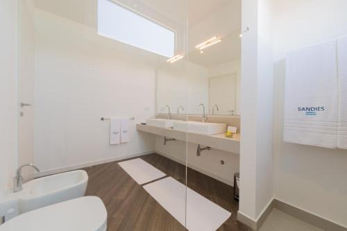 Kúpeľňa v ubytovaní Sandies Bathala