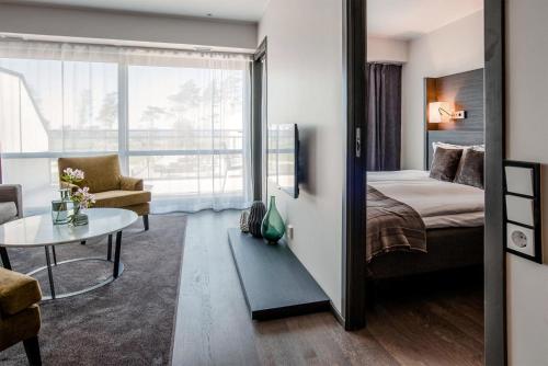 Postel nebo postele na pokoji v ubytování Hotel Riviera Strand