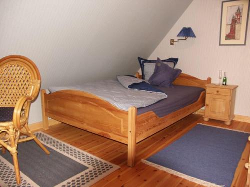 En eller flere senger på et rom på Krohnprinzenhof Hotel Garni und Ferienwohnungen