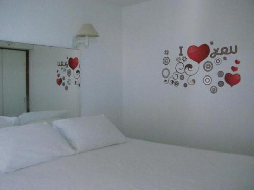 Ένα ή περισσότερα κρεβάτια σε δωμάτιο στο Vip Iracema Flat