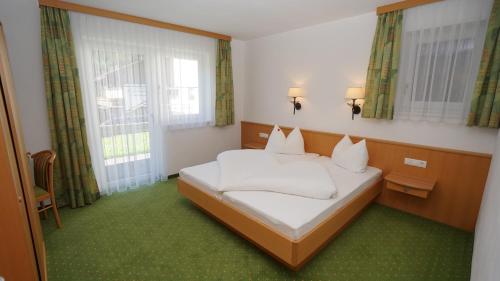 Ένα ή περισσότερα κρεβάτια σε δωμάτιο στο Chalet Lena