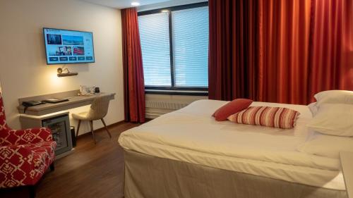 Postel nebo postele na pokoji v ubytování Original Sokos Hotel Seurahuone Kotka