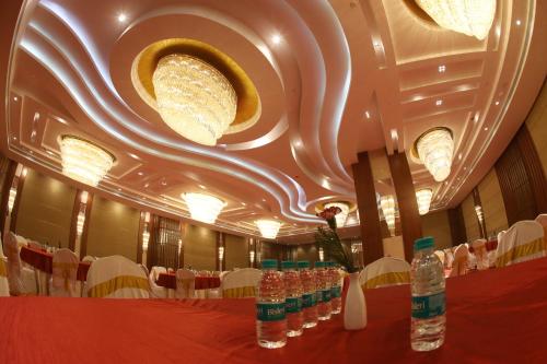 a room with a table with bottles of water on it at Regenta Central RS Chennai OMR SIPCOT in Chennai