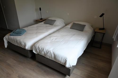 Postel nebo postele na pokoji v ubytování B&B Dujardin