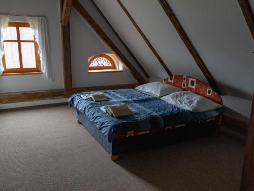 Postel nebo postele na pokoji v ubytování Statek-Hofje