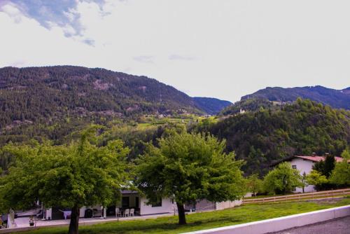 a view of a valley with trees and mountains at Living Apartment Maurer in Sautens