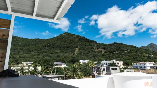a view of a mountain from the balcony of a house at Arkenstone Studios in La Gaulette