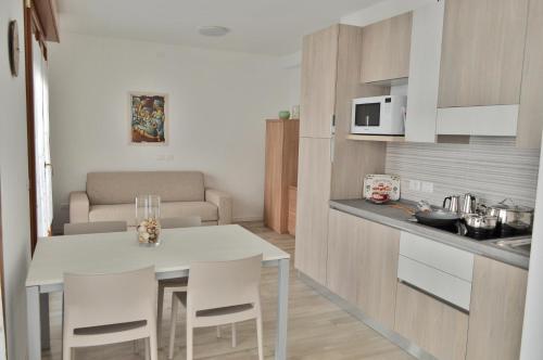 A kitchen or kitchenette at Casa Comisso