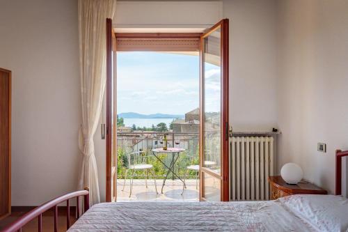 Postel nebo postele na pokoji v ubytování Appartamento Luisa - Vista Lago