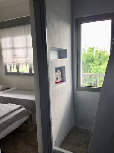 Ένα ή περισσότερα κρεβάτια σε δωμάτιο στο Sea view villa in Olive Garden