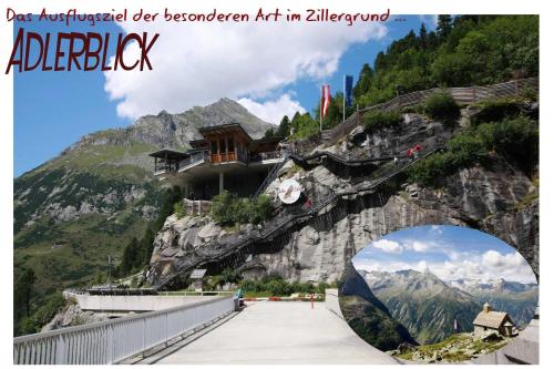 a picture of a bridge on a mountain at S'Dörfl Chalets in Mayrhofen