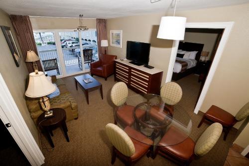 an aerial view of a hotel room with a living room at DeSoto Beach Hotel in Tybee Island