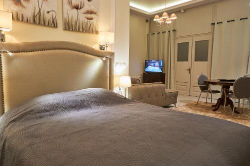 Arxontiko Hotelにあるベッド