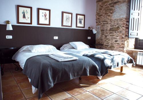 Casa Rural La Torrecilla con PISCINA PRIVADAにあるベッド