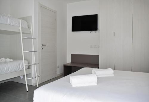 Postel nebo postele na pokoji v ubytování Residence Lake Como