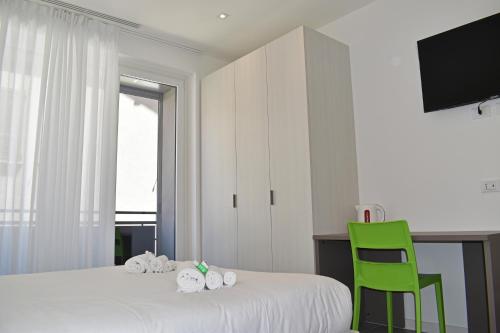 Postel nebo postele na pokoji v ubytování Residence Lake Como