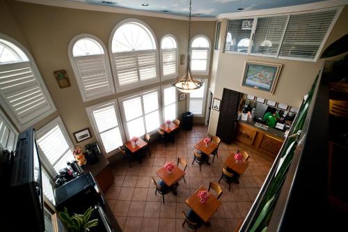 an overhead view of a living room with windows at DeSoto Beach Hotel in Tybee Island