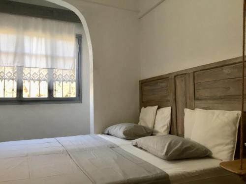 Ένα ή περισσότερα κρεβάτια σε δωμάτιο στο Sea view villa in Olive Garden
