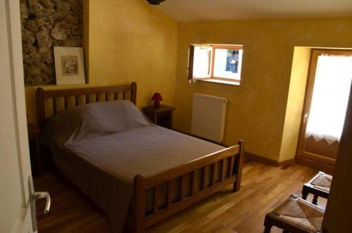 Postel nebo postele na pokoji v ubytování Gîte le Clos de Ceintres