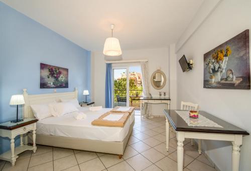 Una cama o camas en una habitación de Stamatakis Boutique Studios