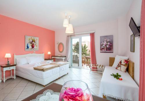 Una cama o camas en una habitación de Stamatakis Boutique Studios