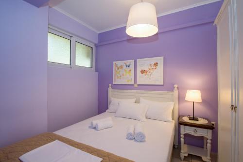 Una cama o camas en una habitación de Stamatakis Boutique Studios