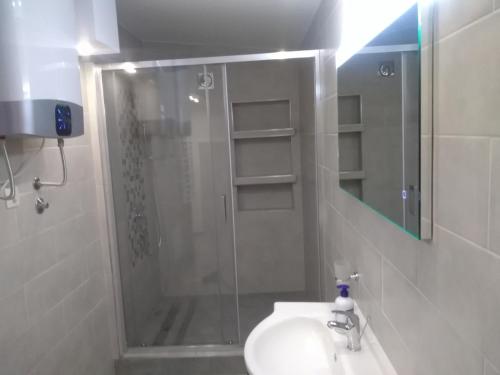 Koupelna v ubytování Apartments Villa Čučuk