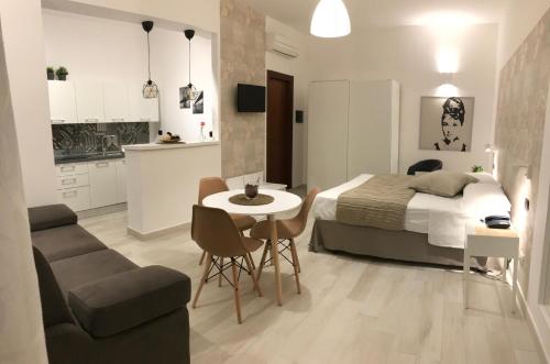 Posezení v ubytování Holiday Rooms Portale Pirrera