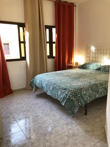 Postel nebo postele na pokoji v ubytování APARTAMENTO GUAJARA