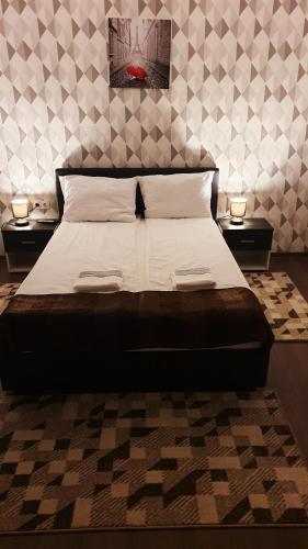 Un pat sau paturi într-o cameră la River Star