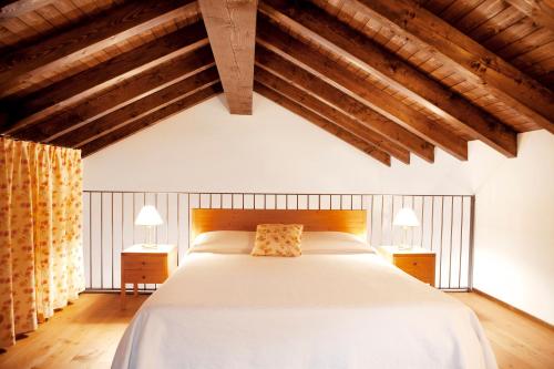 A bed or beds in a room at Agriturismo l'Uva e le Stelle