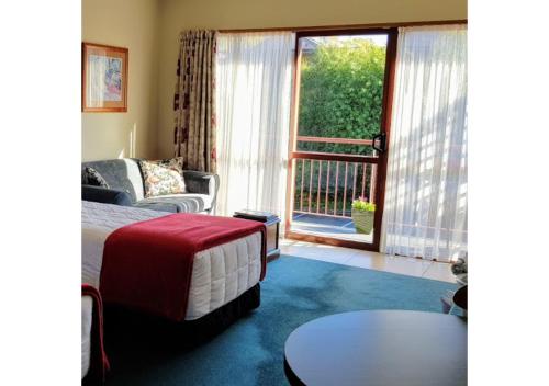 Area soggiorno di Aspen Lodge Motel