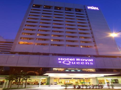 a hotel royal queens building with a sign on it at Hotel Royal Queens in Singapore