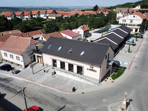an overhead view of a town with a building at Penzion U Křížku in Kobylí